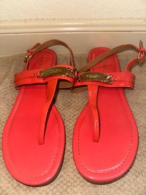 Coach Bright Coral Patent Leather T-Strap Sandals with Gold Hardware